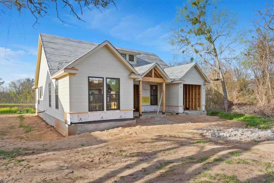5208 Bogey Lane Waco, TX 76708 - Photo 2 of 5 a front view of a house with a yard
