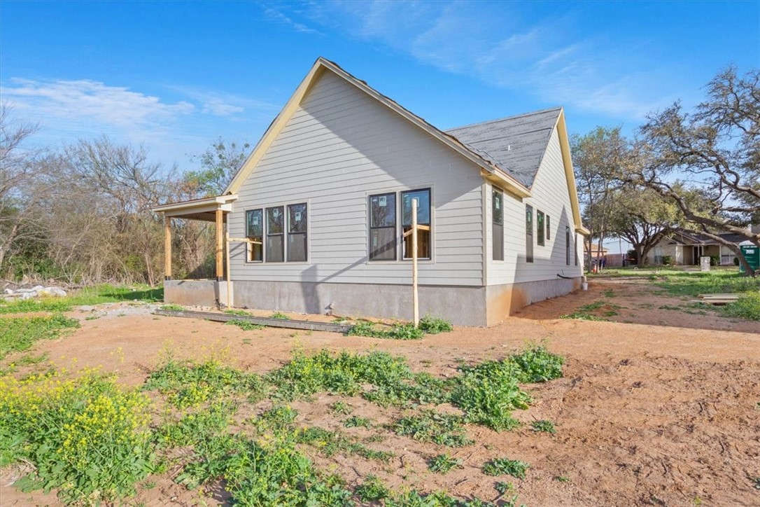 5208 Bogey Lane Waco, TX 76708 - Photo 5 of 5 a view of a house with a yard