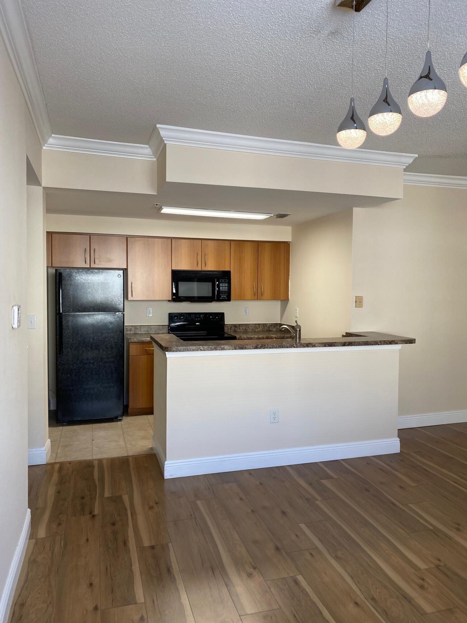 5960 West Sample Road, Unit 208 Coral Springs, FL 33067 - Photo 2 of 11 kitchen2