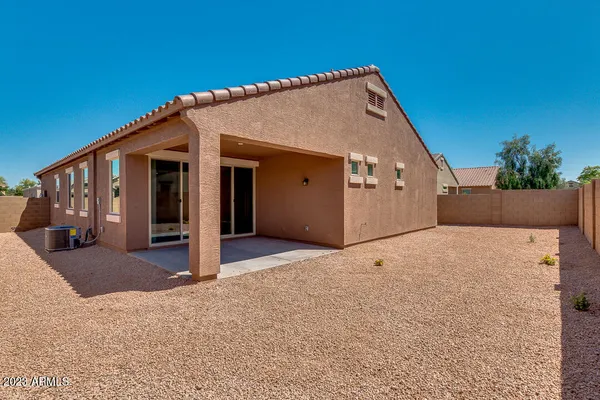 a view of a backyard of a house