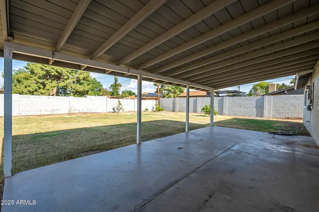 a view of a backyard of the house