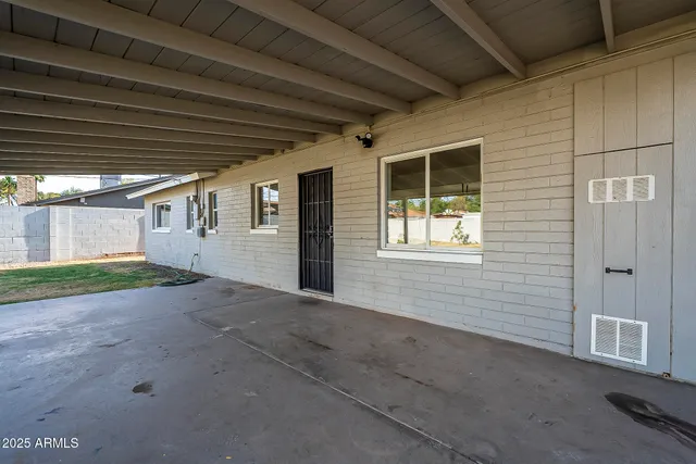 a view of a backyard of a house