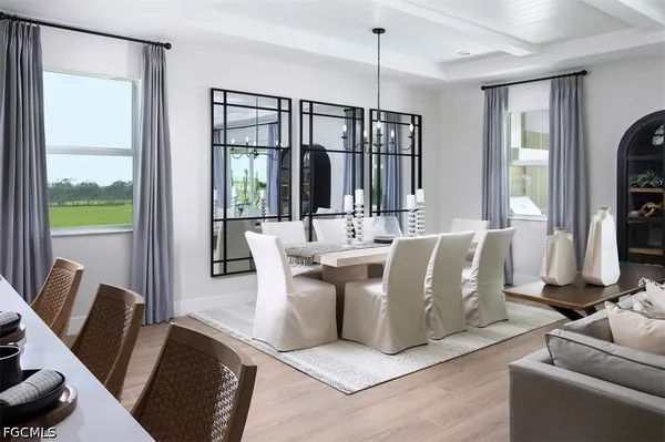 a view of a dining room with furniture window and outside view
