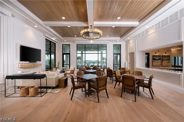 a living room with lots of furniture and a view of living room