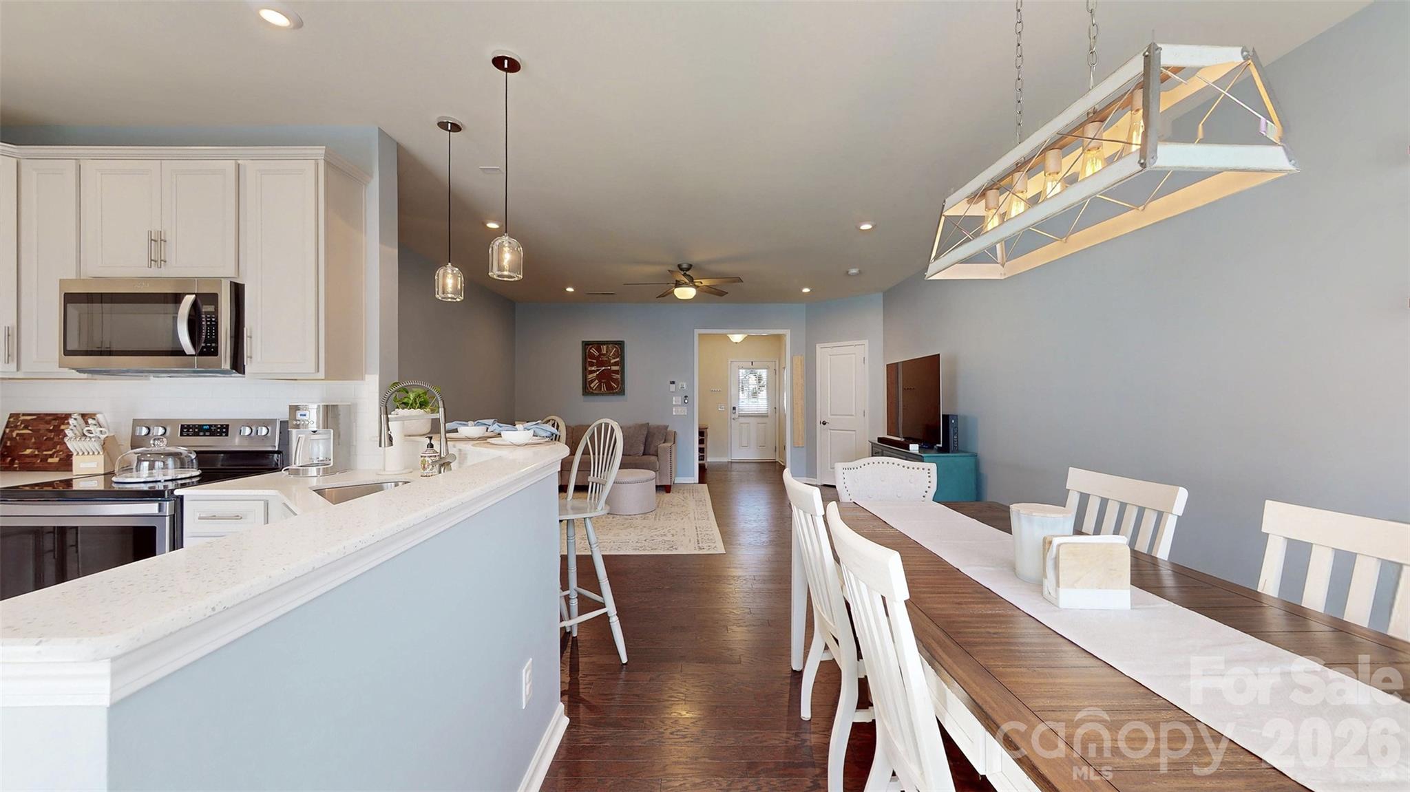 827 Canoe Song Road Fort Mill, SC 29708 - Photo 11 of 33 a large kitchen with a table and chairs