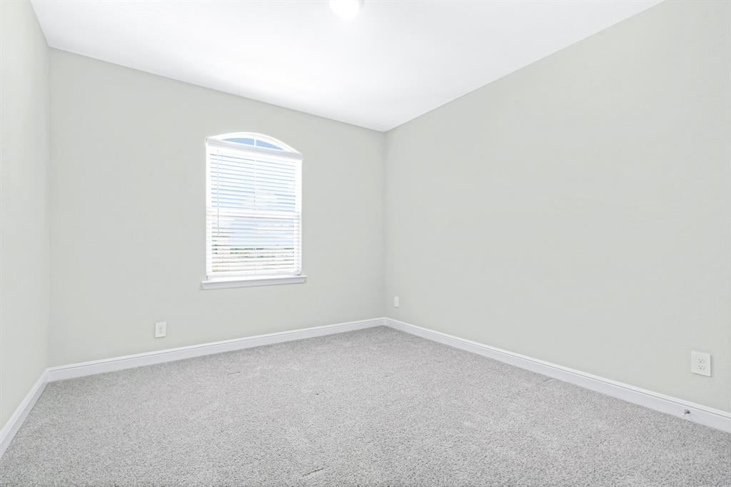 15501 Balham Path Fort Worth, TX 76247 - Photo 12 of 22 an empty room with a window