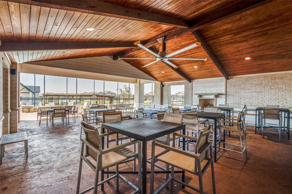 15501 Balham Path Fort Worth, TX 76247 - Photo 19 of 22 a view of a dining room with furniture window and outside view