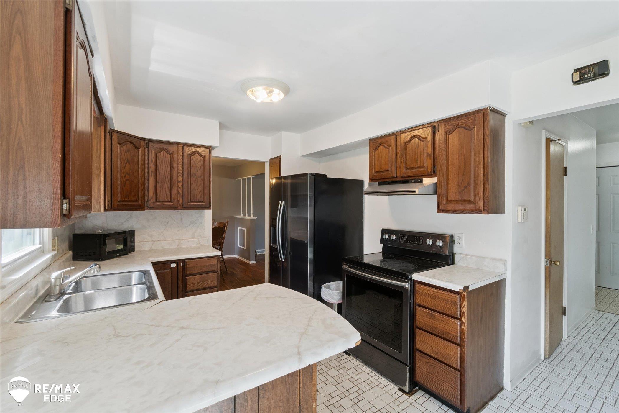 1825 Springfield Street Flint, MI 48503 - Photo 16 of 54 50185018-2ace7966-51b7-4f6c-bb65-db903cf401af.JPG