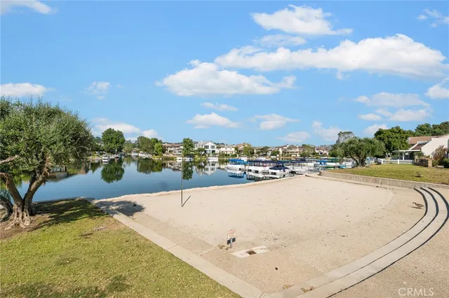 a view of swimming pool with a yard