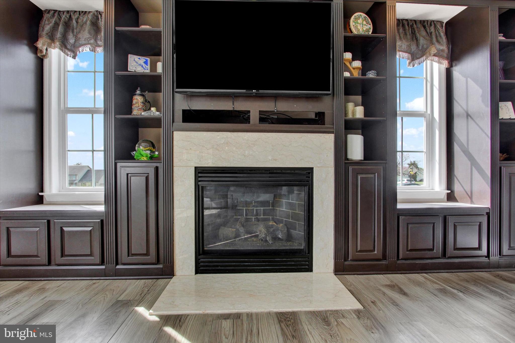 5010 Grandview Road Hanover, PA 17331 - Photo 22 of 42 a living room with a fireplace and a flat screen tv