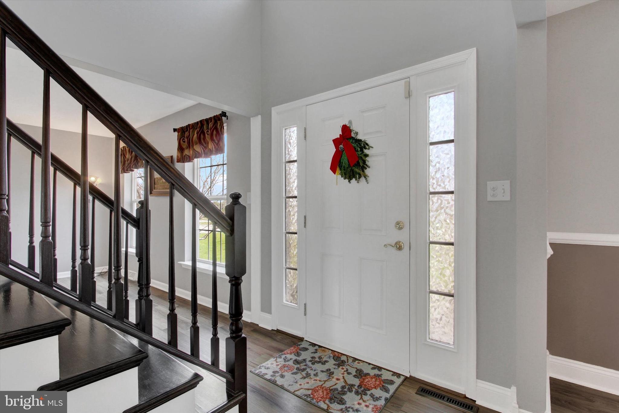 5010 Grandview Road Hanover, PA 17331 - Photo 3 of 42 a view of an entryway with wooden floor and stairs