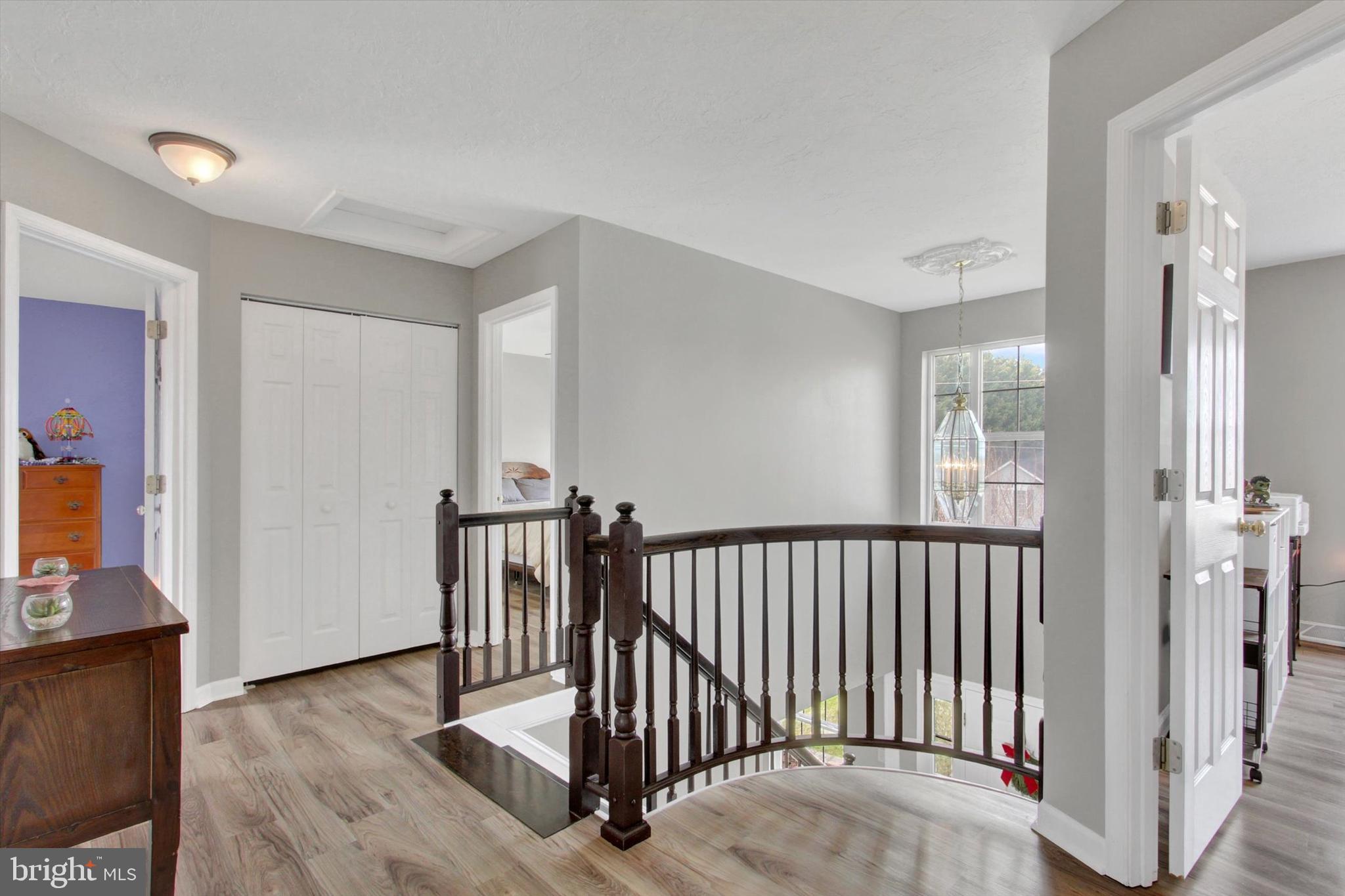 5010 Grandview Road Hanover, PA 17331 - Photo 32 of 42 a view of hallway with wooden floor and stairs