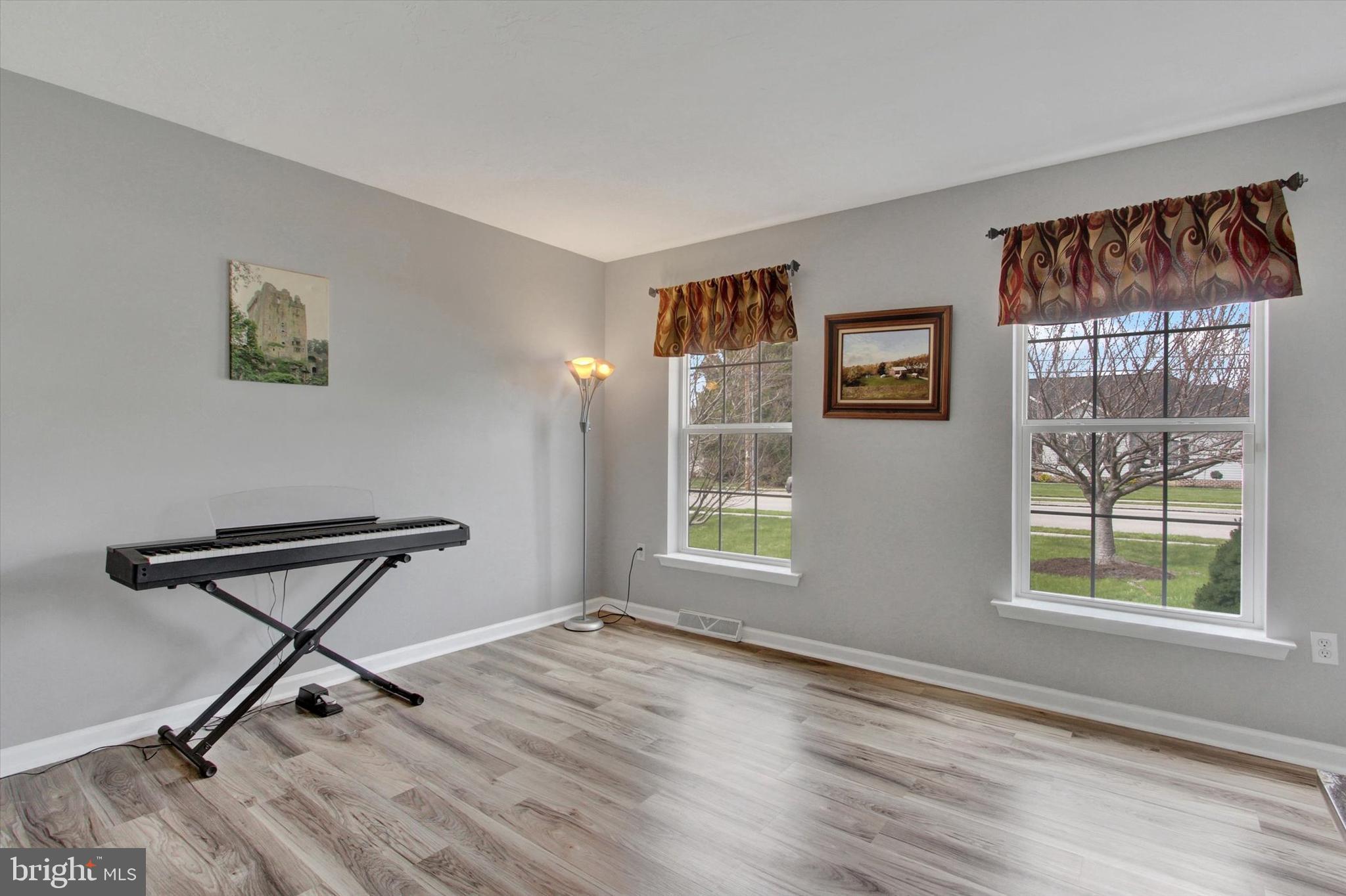 5010 Grandview Road Hanover, PA 17331 - Photo 7 of 42 a view of an empty room with a window and wooden floor