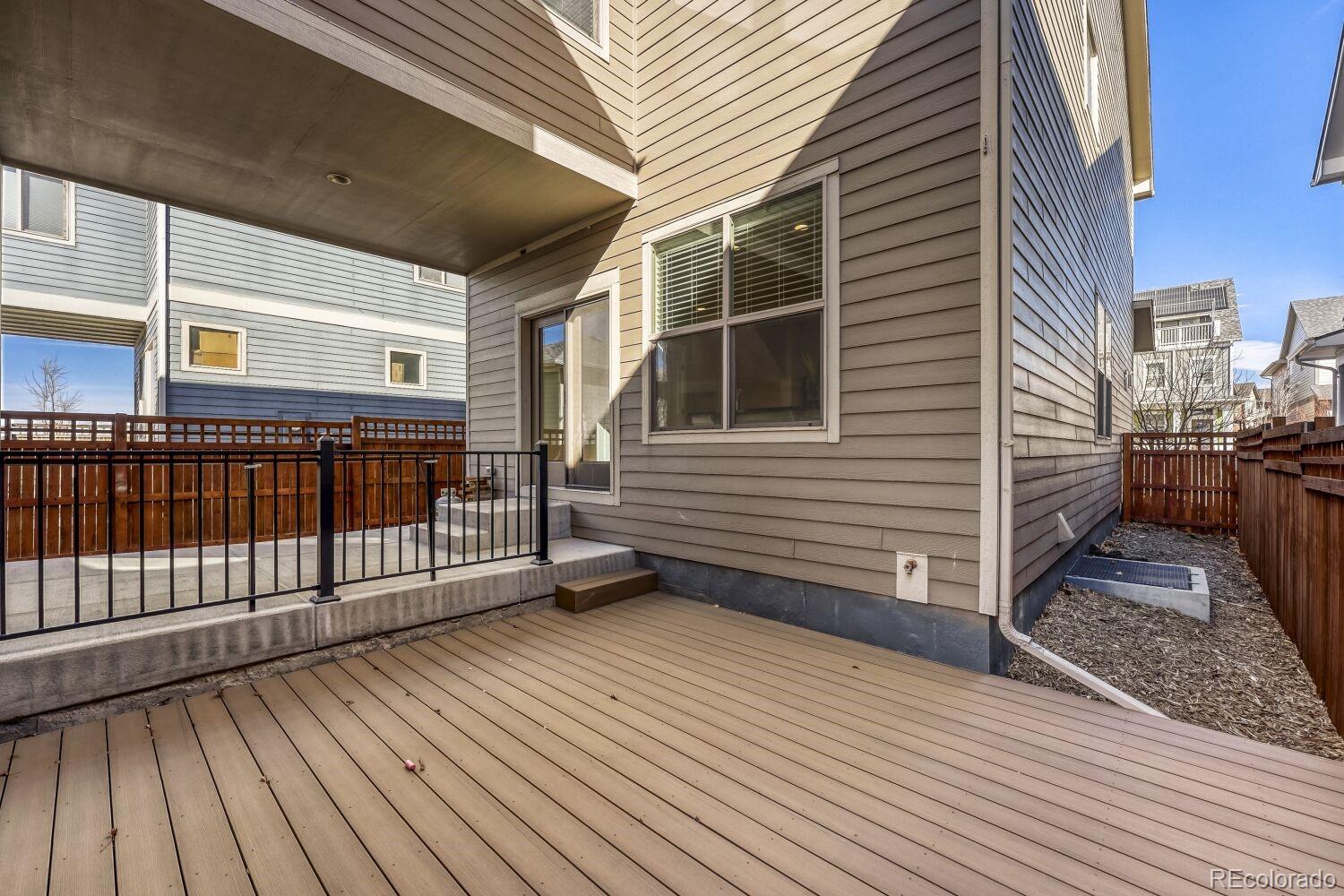 2861 Lima Street Denver, CO 80238 - Photo 37 of 45 a view of a balcony with wooden floor