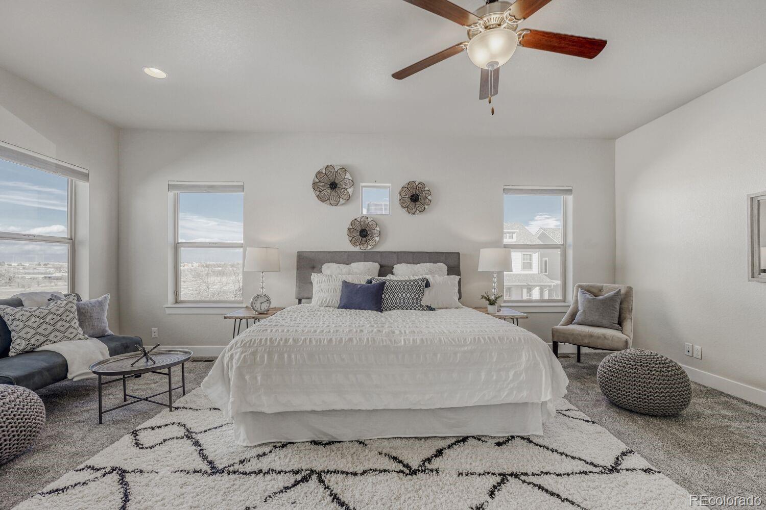 2861 Lima Street Denver, CO 80238 - Photo 9 of 45 a bedroom with a bed and window