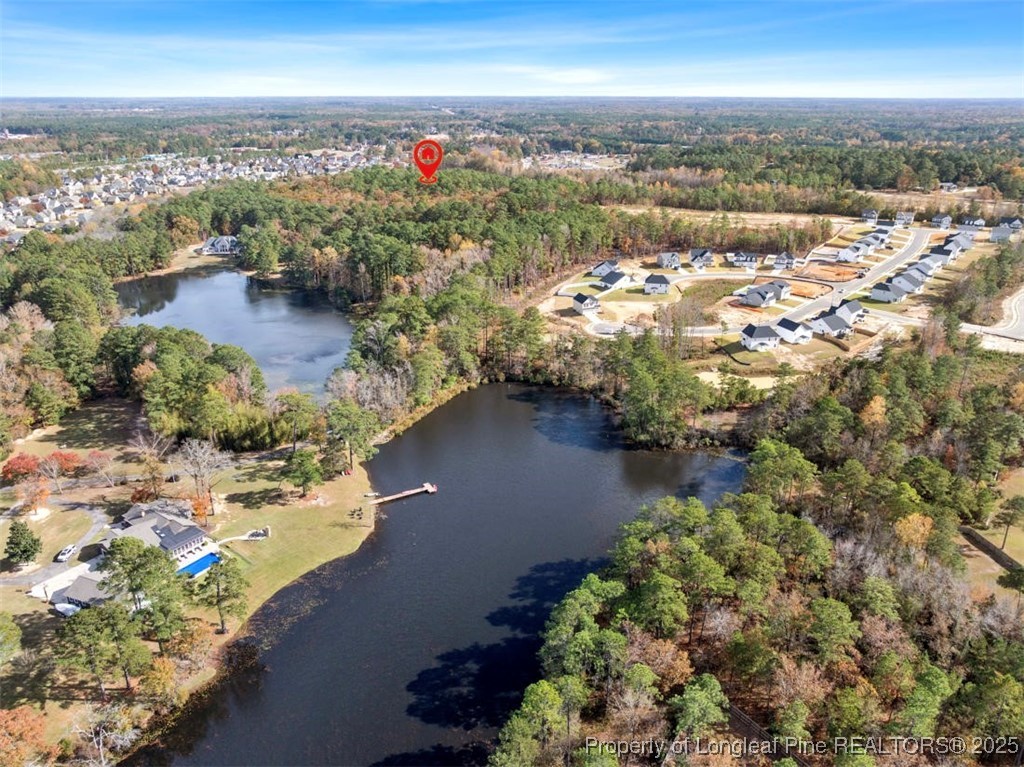 6518 Stone Mountain Farm Road Fayetteville, NC 28311 - Photo 4 of 5 an aerial view of residential houses with outdoor space