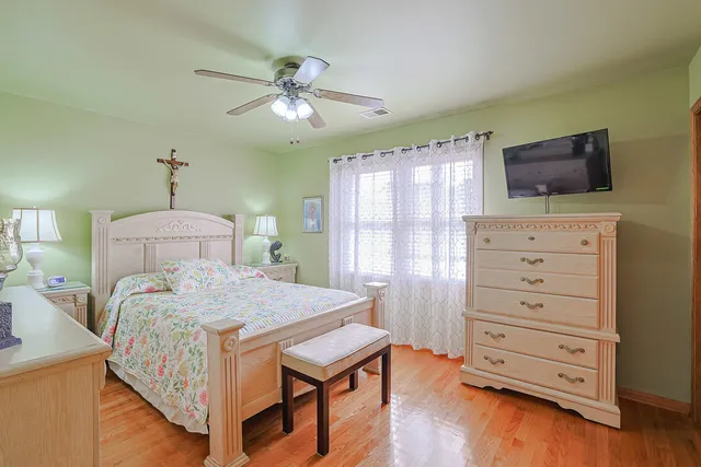 a bedroom with a bed and furniture