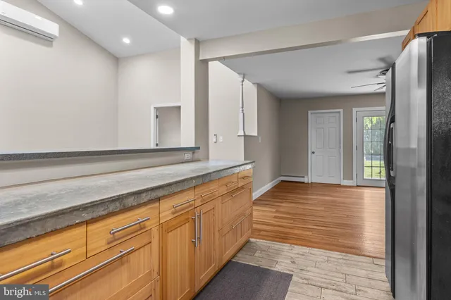 a view of a bathroom with sink and mirror