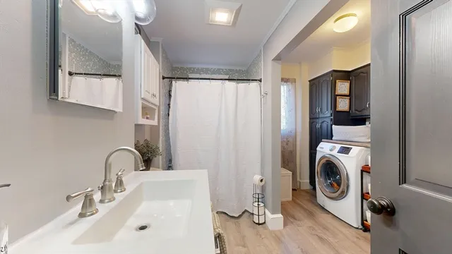 a view of washer and dryer in a utility room