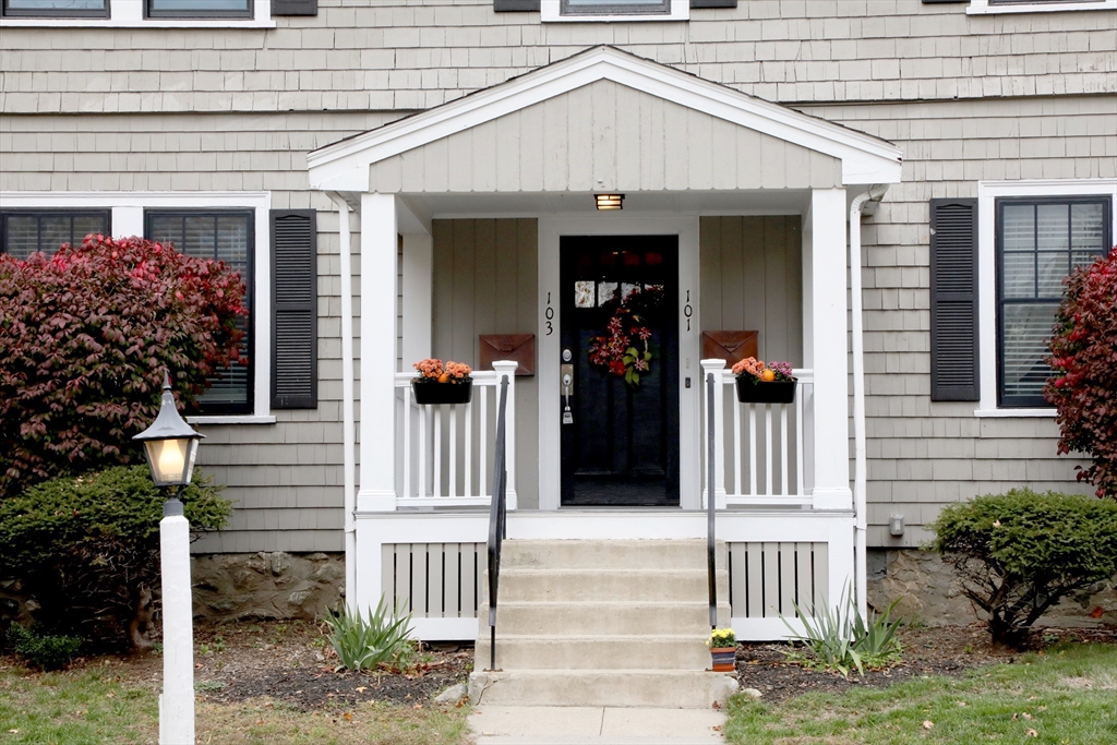 101 King Street, Unit 101 Reading, MA 01867 - Photo 33 of 33 a front view of a house with a porch