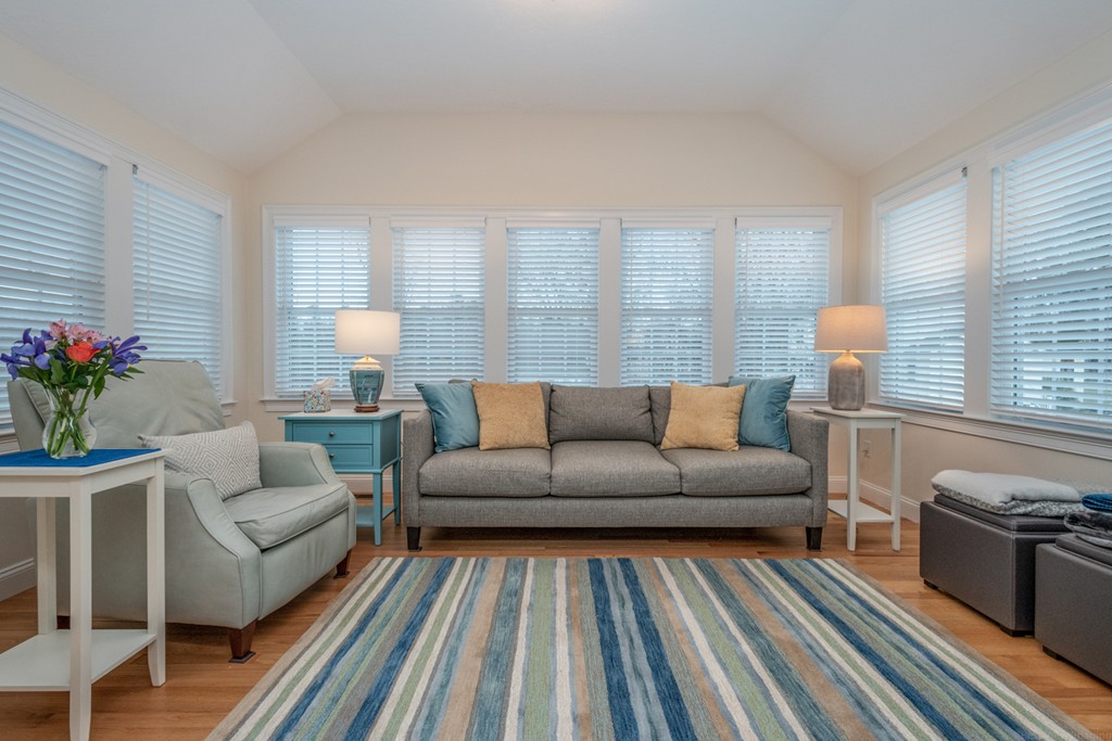 1094 Hill Road, Unit 1094 Boxborough, MA 01719 - Photo 15 of 38 a living room with furniture and a couch