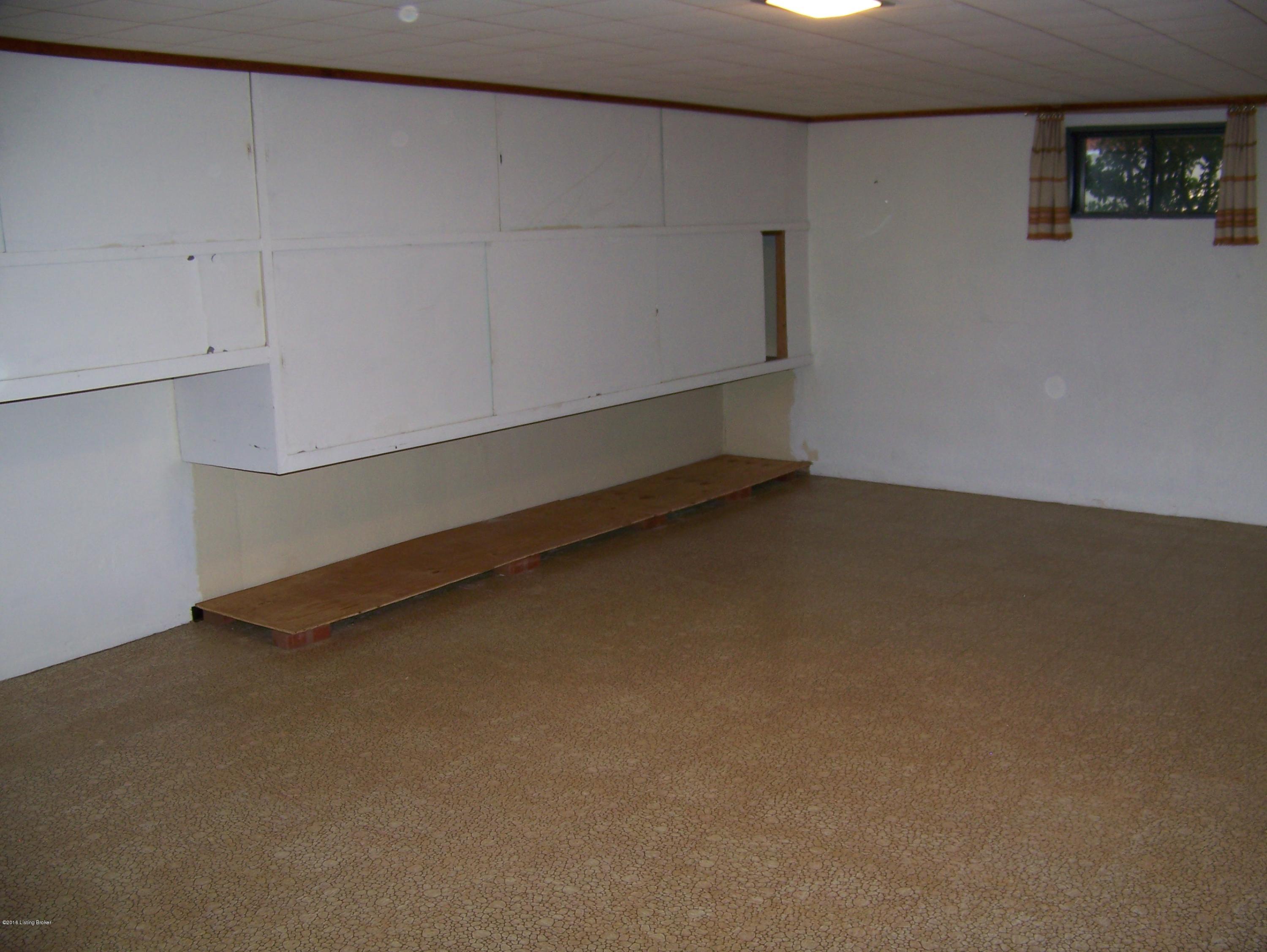 2913 Nepperhan Road Louisville, KY 40218 - Photo 26 of 32 family room storage