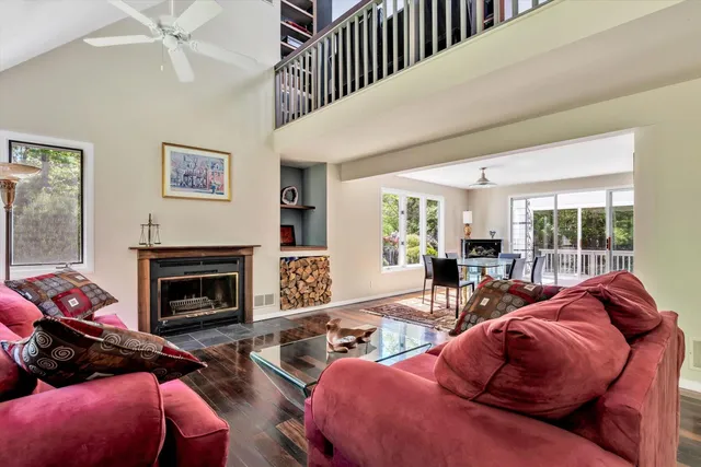a bedroom with furniture and a flat screen tv