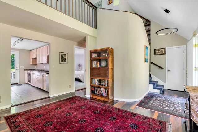 a picture of a bathroom with a white wall