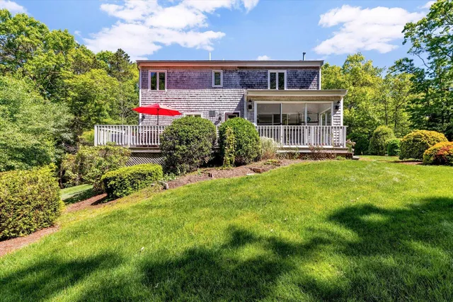 a kitchen with stainless steel appliances a refrigerator sink and cabinets