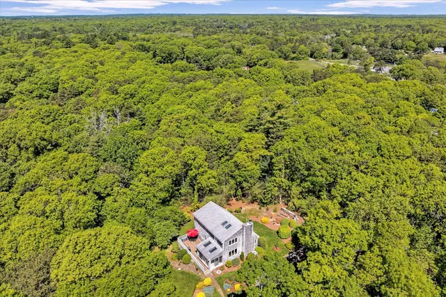 a very nice looking kitchen with a large window