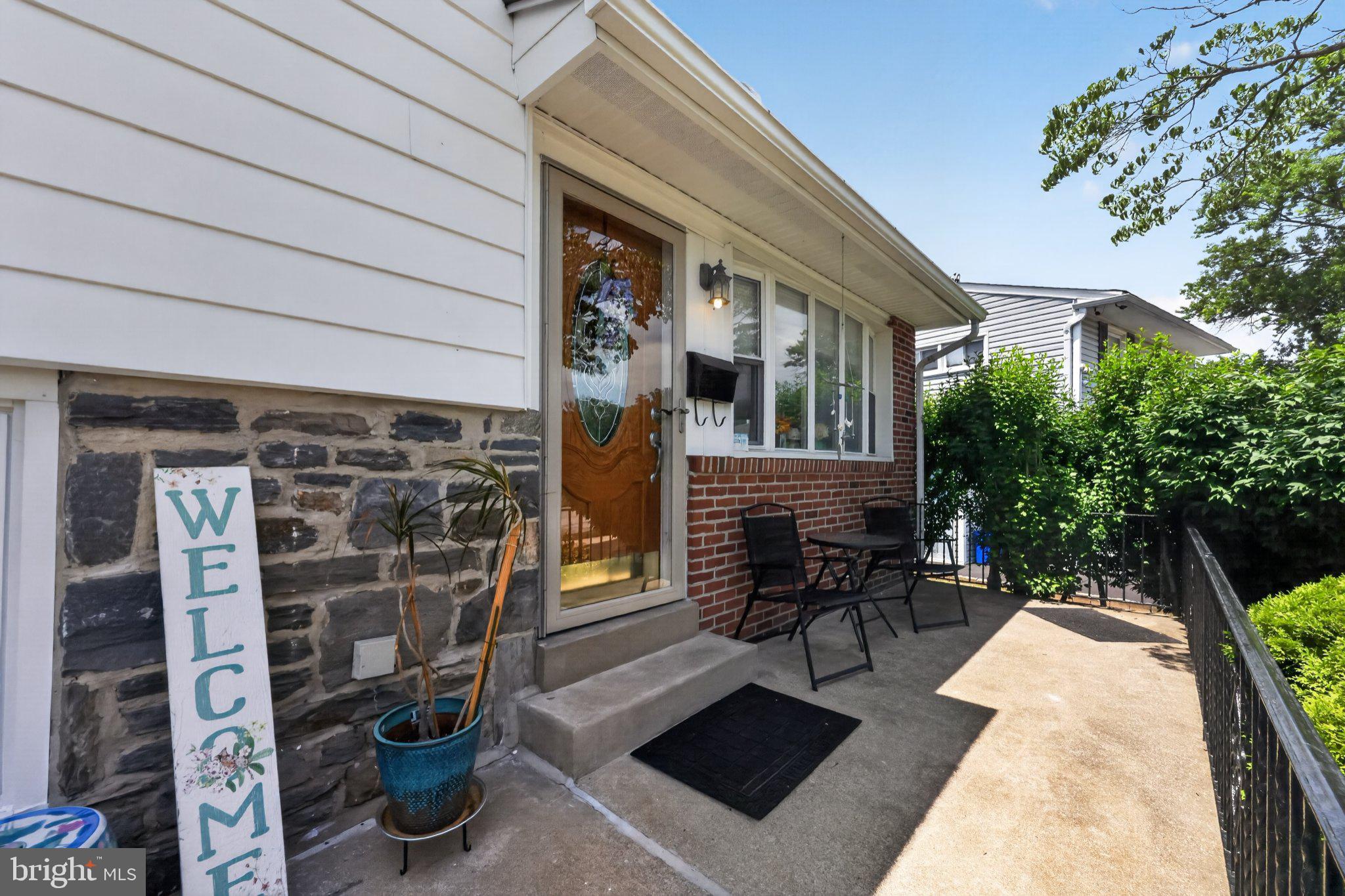 1121 Wynnbrook Road Secane, PA 19018 - Photo 2 of 36 Charming entryway with lush greenery.
