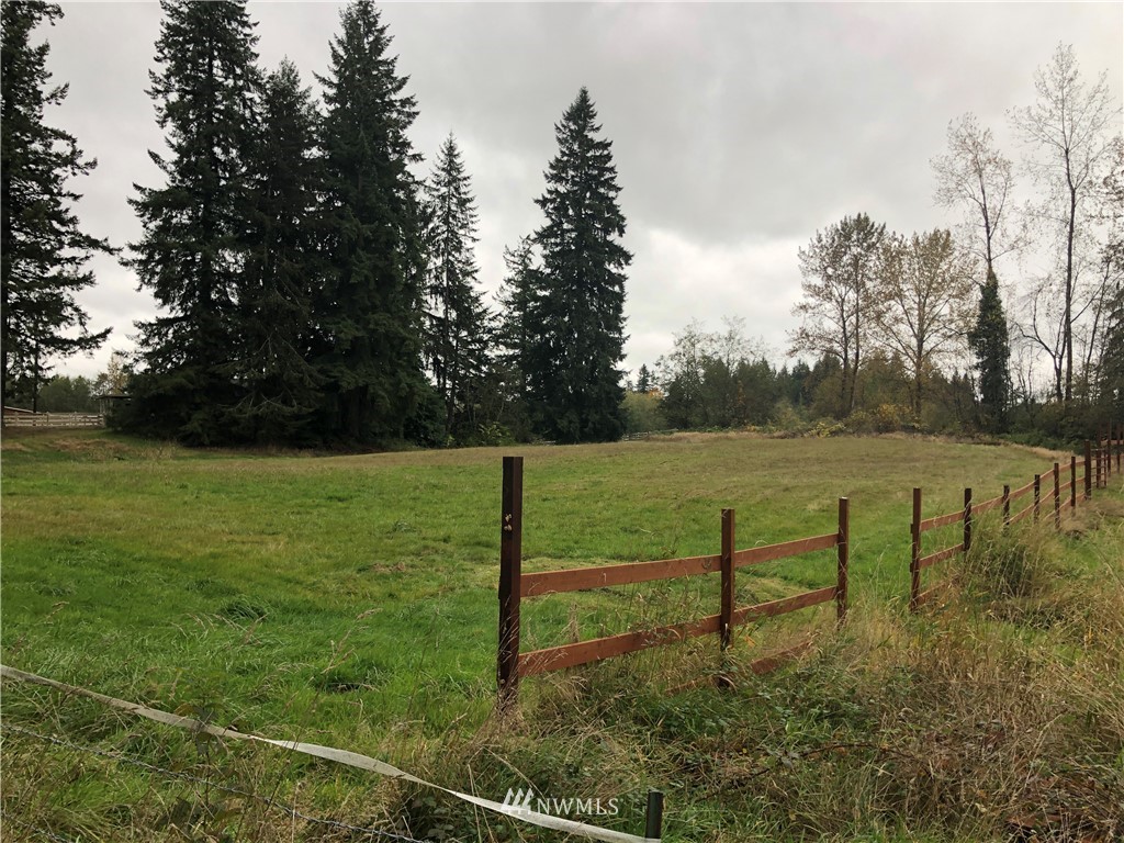 17706 Butler Road Snohomish, WA 98290 - Photo 21 of 22 a view of a garden with wooden fence