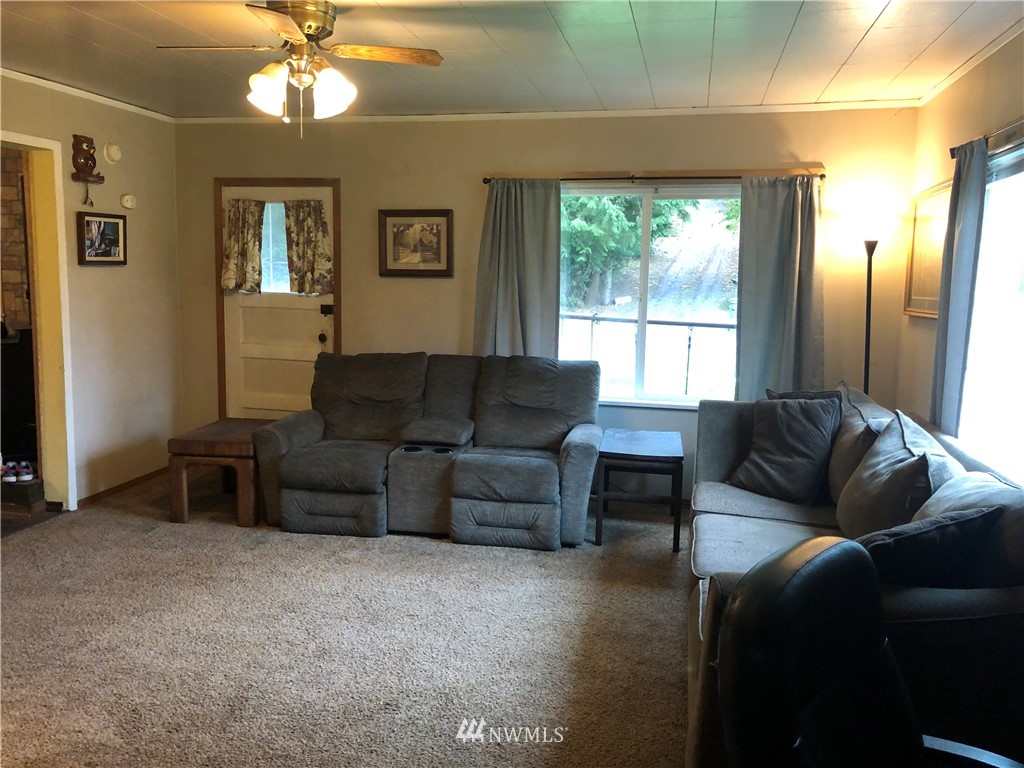 17706 Butler Road Snohomish, WA 98290 - Photo 8 of 22 a living room with furniture and a window