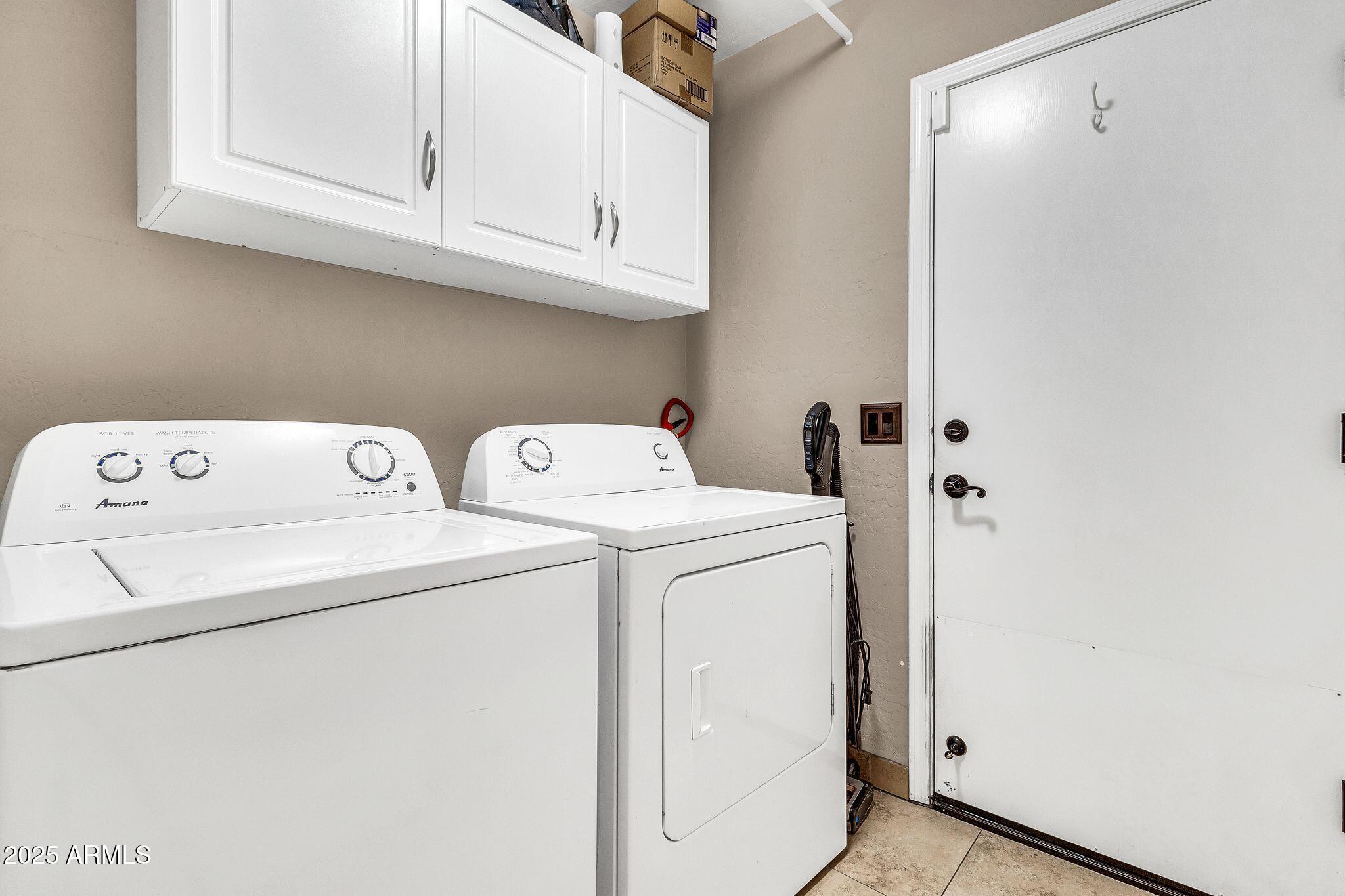 3048 East Erie Street Gilbert, AZ 85295 - Photo 27 of 41 a utility room with dryer and washer