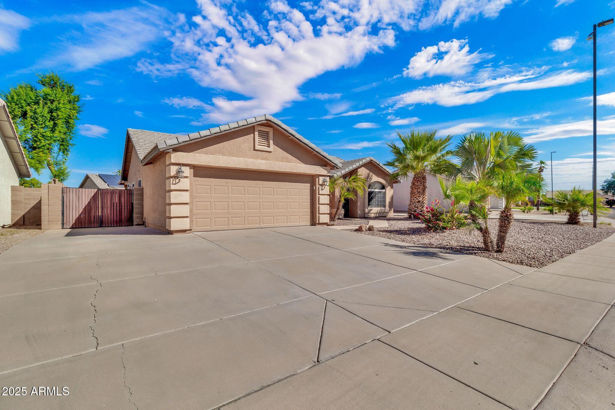 3048 East Erie Street Gilbert, AZ 85295 - Photo 2 of 44 a view of a house with entertaining space