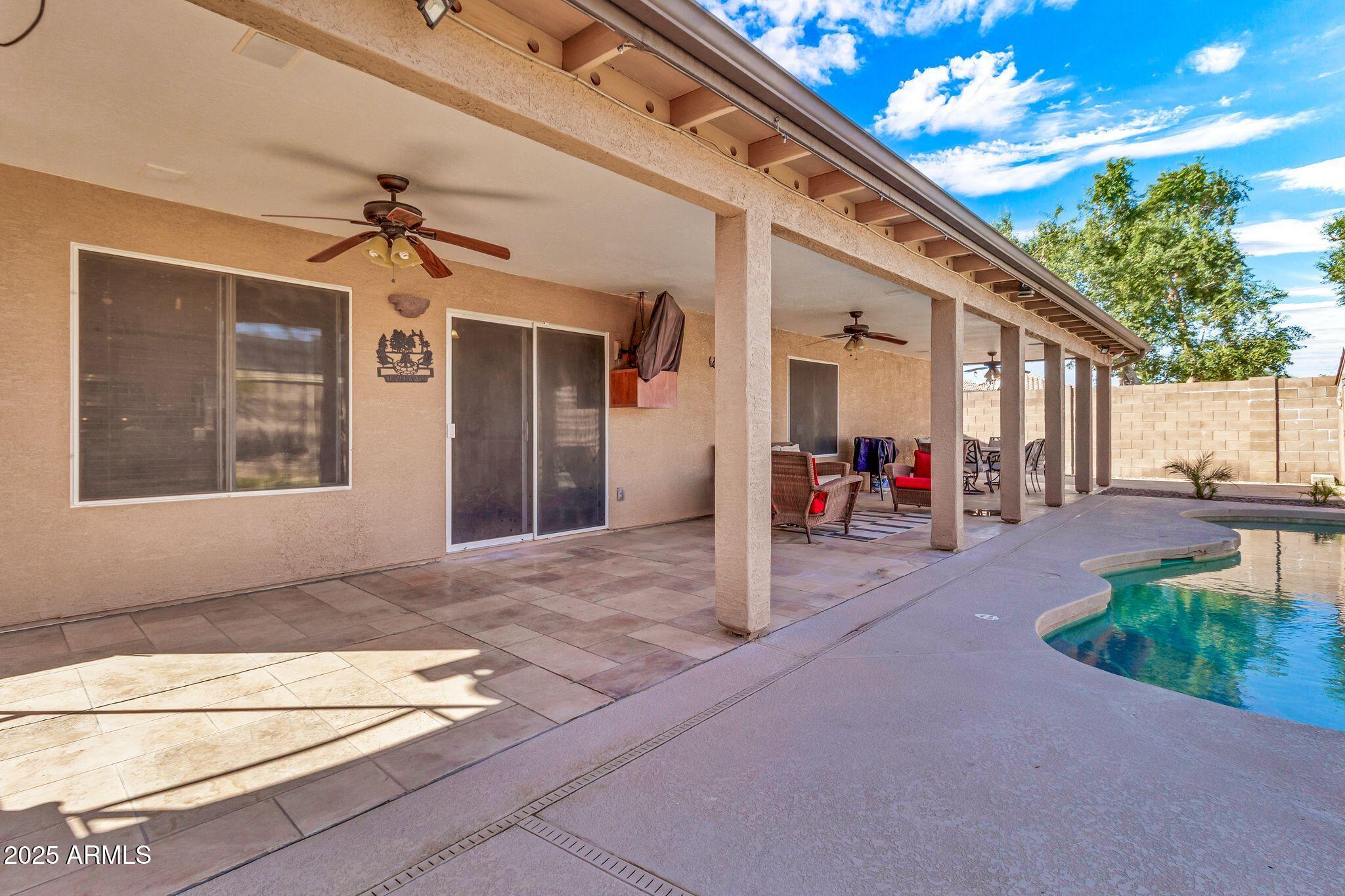 3048 East Erie Street Gilbert, AZ 85295 - Photo 36 of 41 a view of a porch with seating space