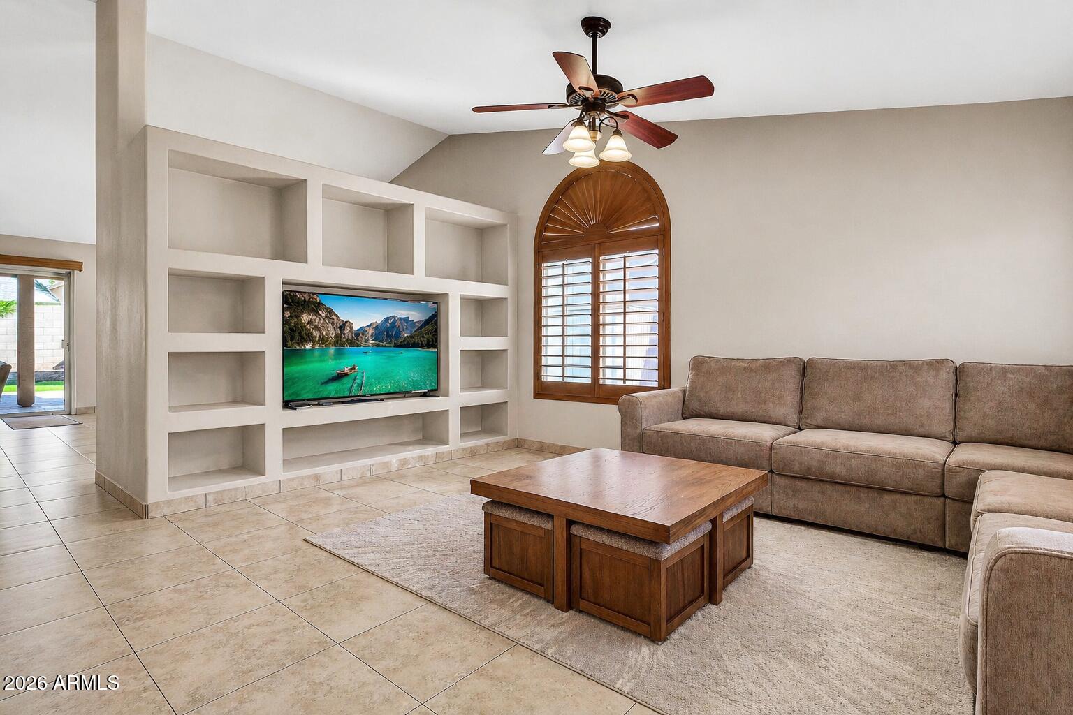 3048 East Erie Street Gilbert, AZ 85295 - Photo 6 of 41 a living room with furniture and windows