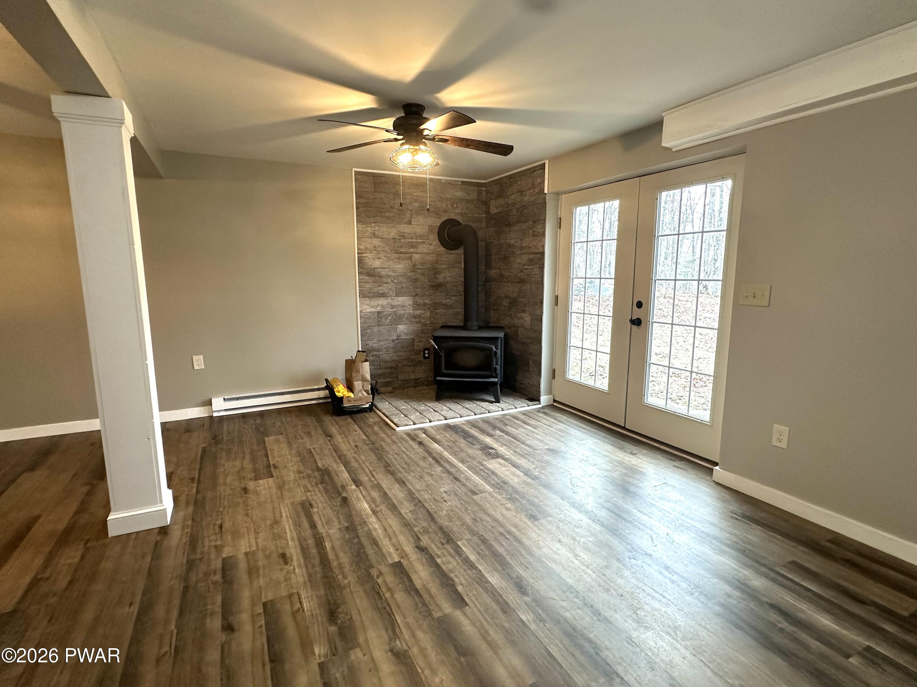 2116 Spring Drive Bushkill, PA 18324 - Photo 13 of 19 wooden floor in an empty room with a window