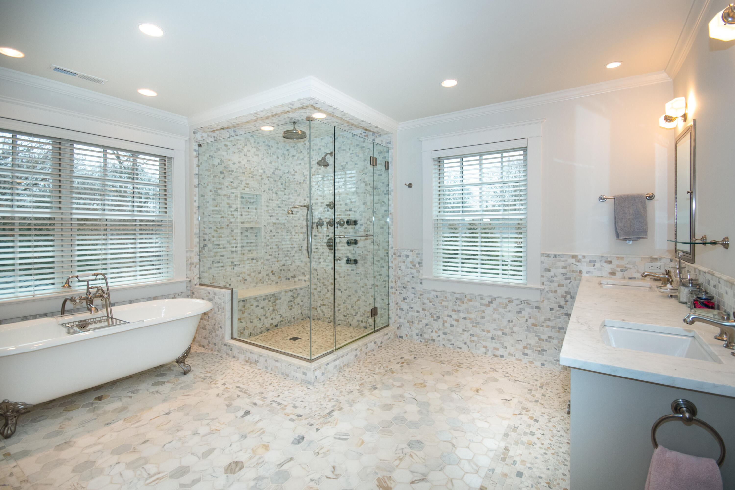 10 Wakeman Road Darien, CT 06820 - Photo 16 of 38 a spacious bathroom with a shower sink and mirror
