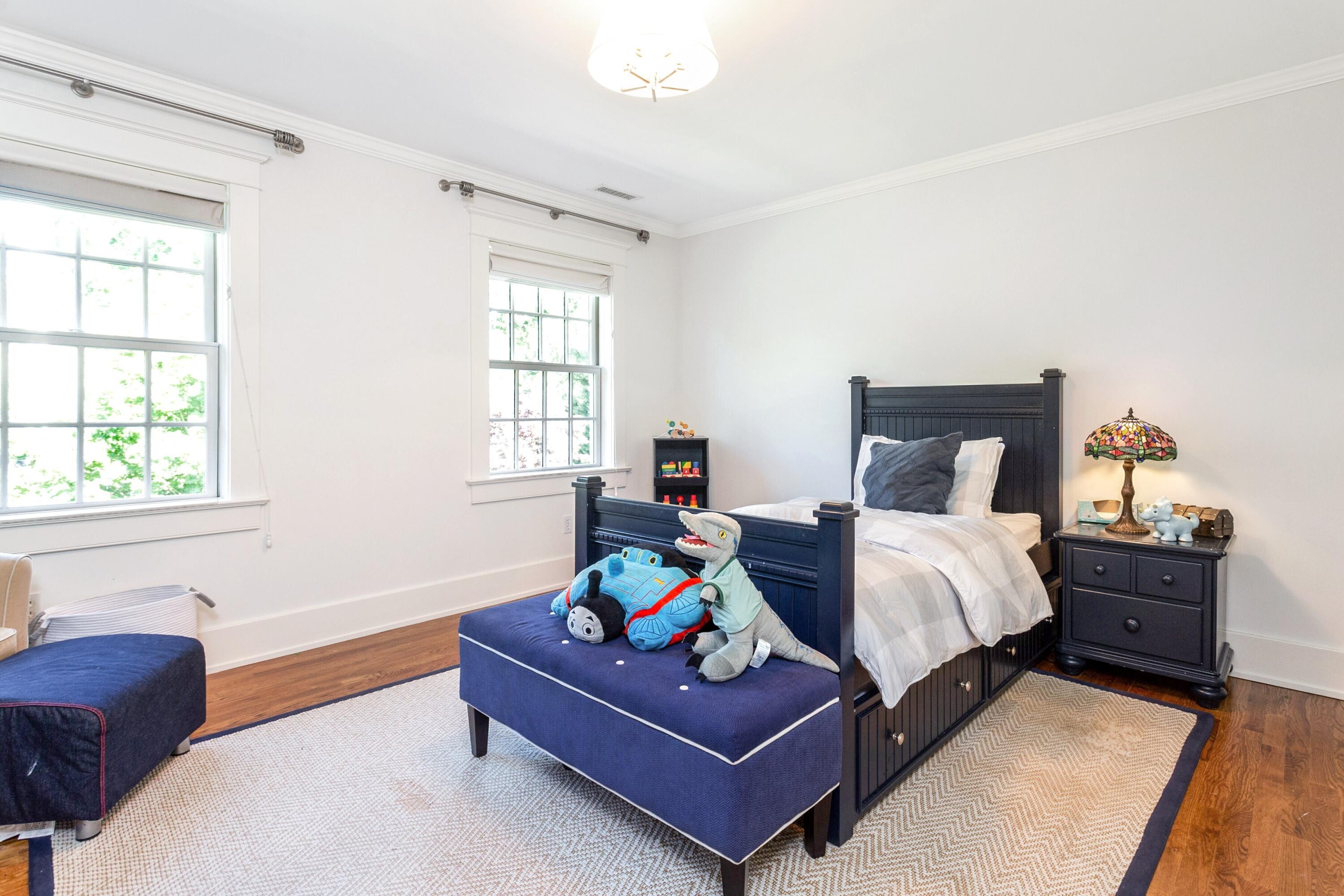 10 Wakeman Road Darien, CT 06820 - Photo 17 of 38 a bedroom with a bed and window