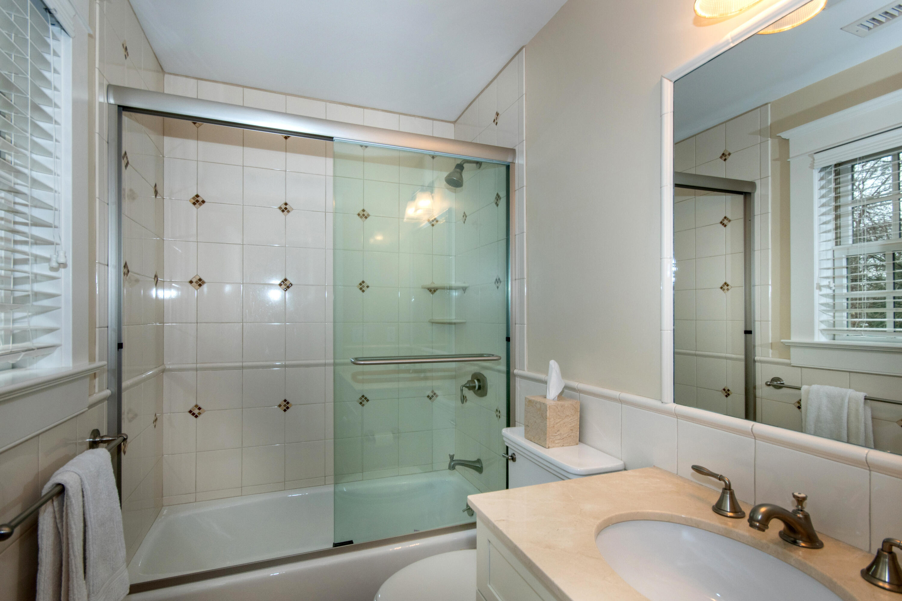 10 Wakeman Road Darien, CT 06820 - Photo 20 of 38 a bathroom with a sink toilet and shower