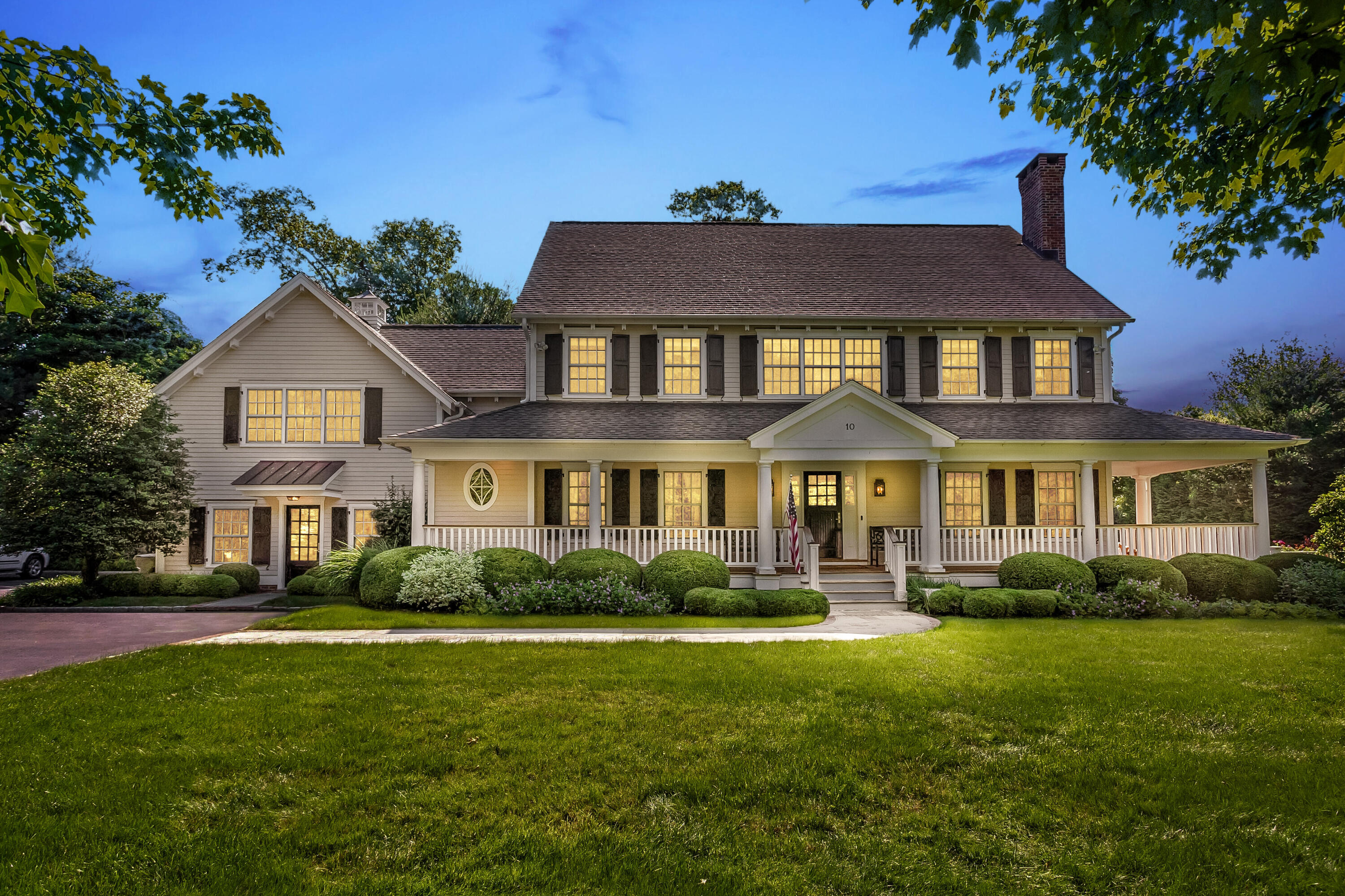 10 Wakeman Road Darien, CT 06820 - Photo 2 of 38 a front view of a house with a garden