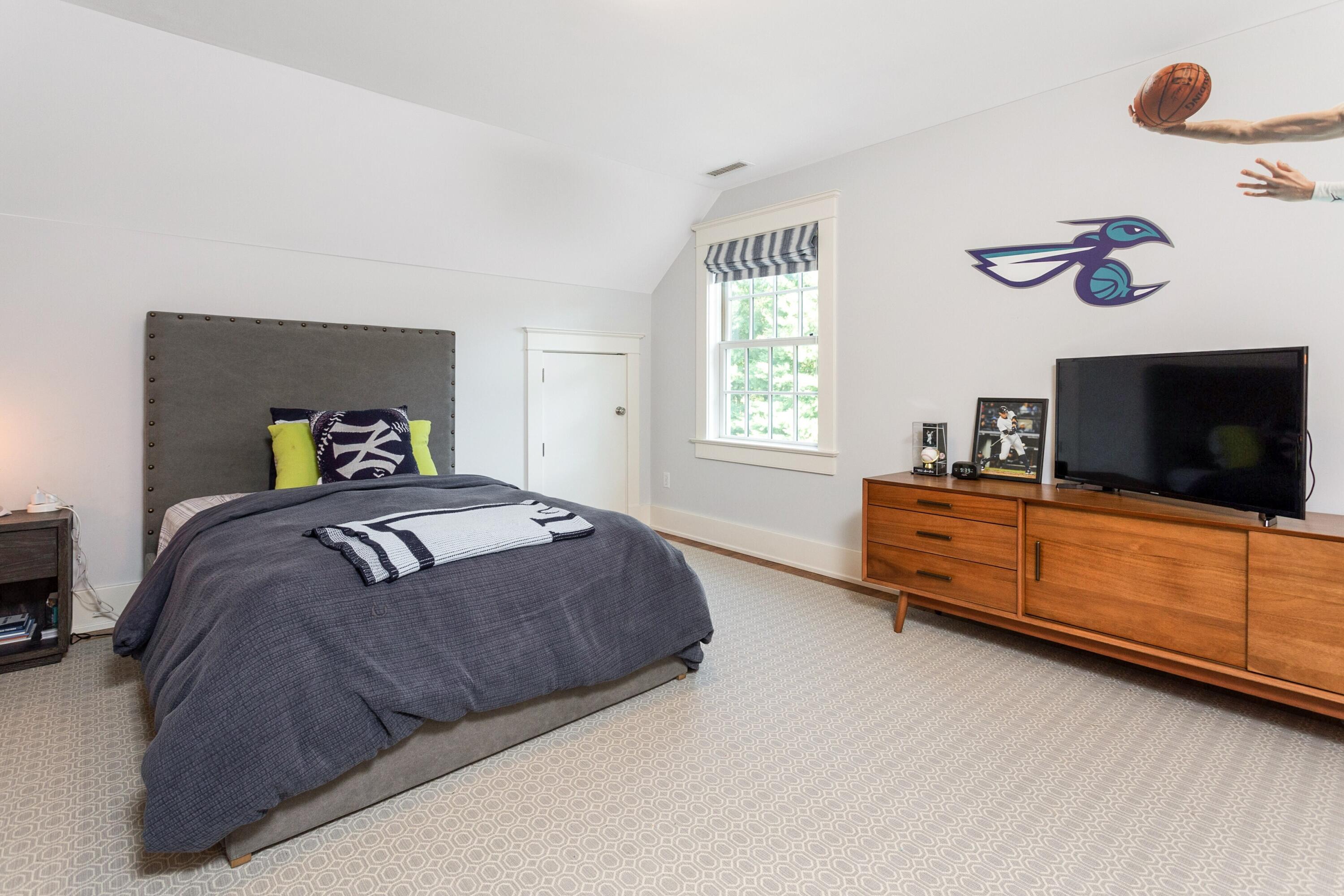 10 Wakeman Road Darien, CT 06820 - Photo 23 of 38 a bedroom with a bed and a tv