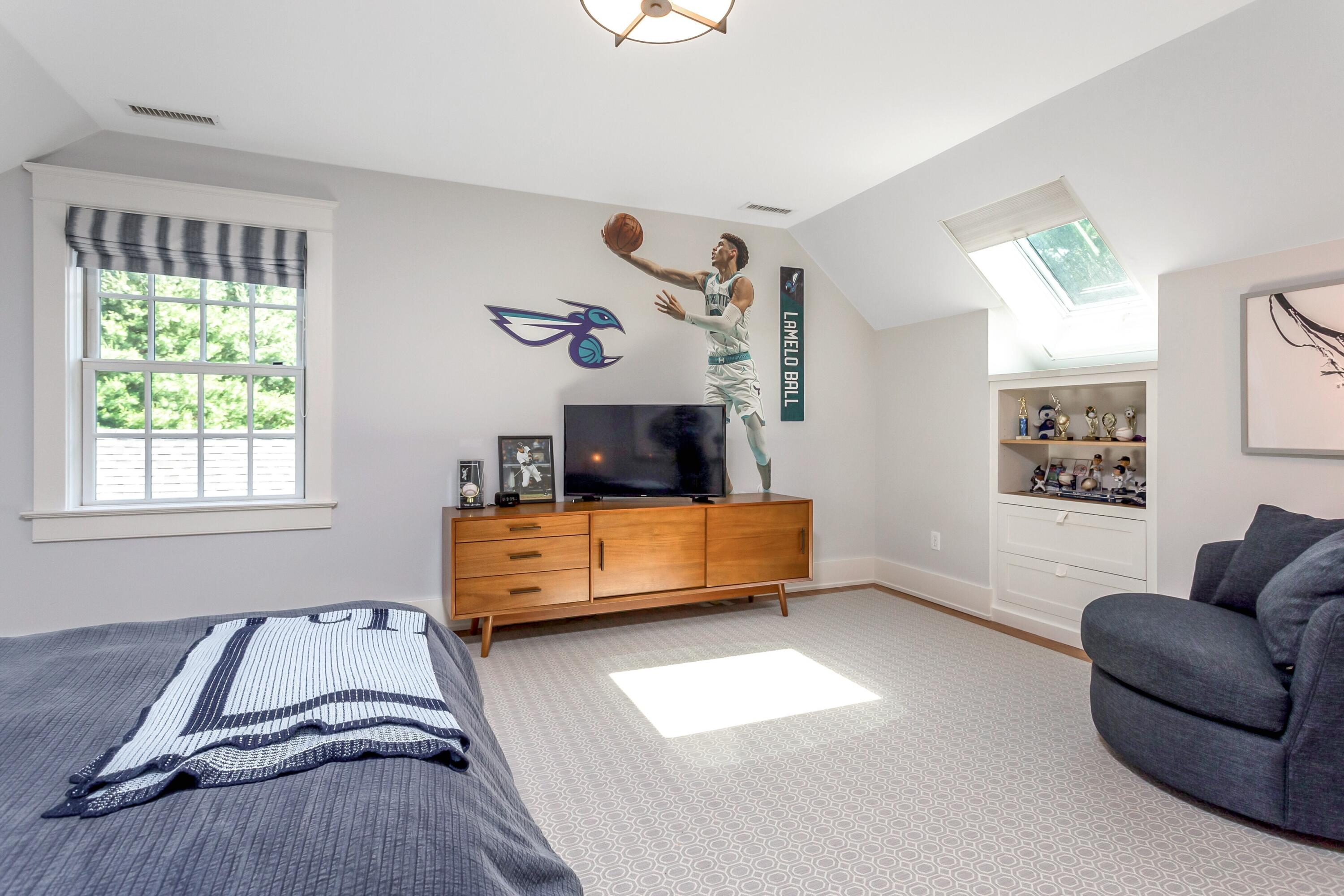 10 Wakeman Road Darien, CT 06820 - Photo 24 of 38 a bedroom with furniture and a window