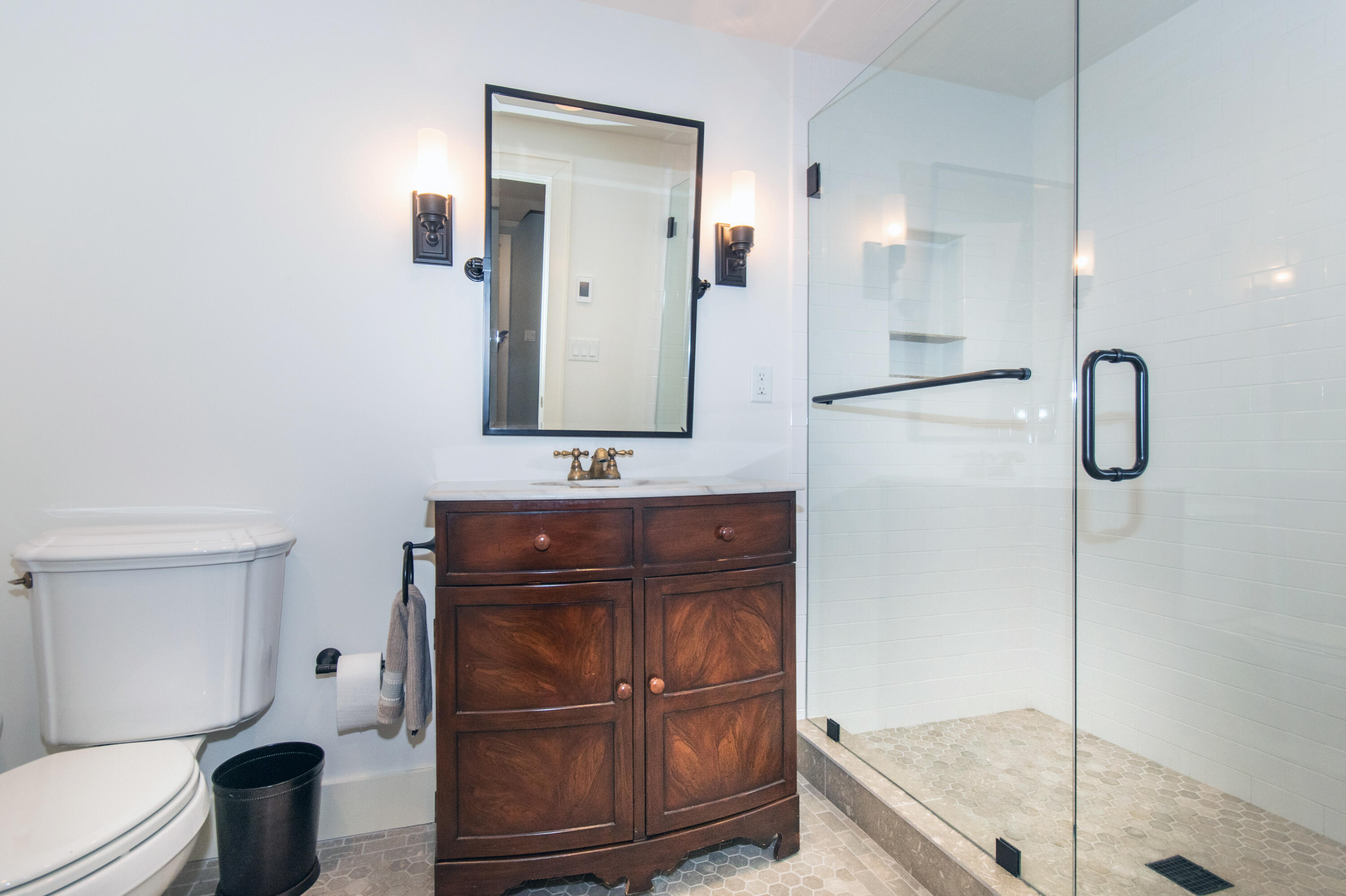 10 Wakeman Road Darien, CT 06820 - Photo 29 of 38 a bathroom with a sink a toilet and shower