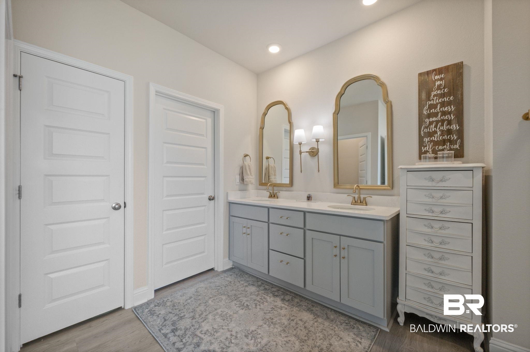 681 Calibre Street Fairhope, AL 36532 - Photo 34 of 56 Bathroom with vanity and hardwood / wood-style floors