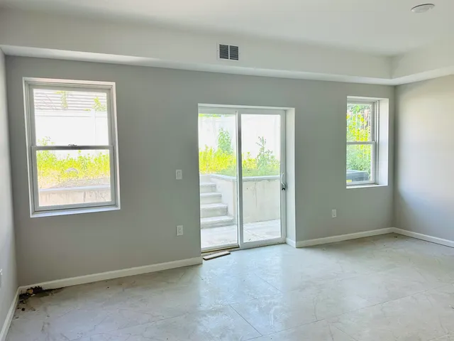 an empty room with windows