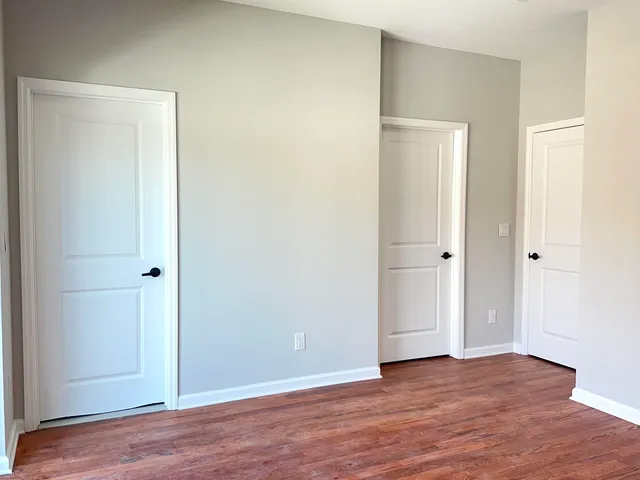 a bathroom with a toilet sink and bathtub