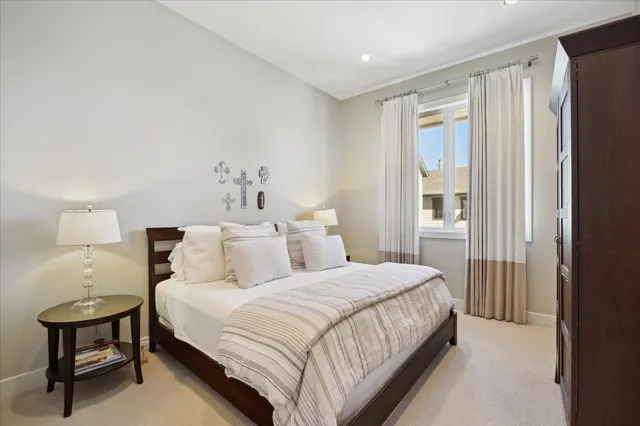 a view of a bedroom with furniture and staircase