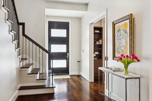 a view of entryway with wooden floor
